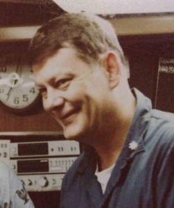 A casual photo of Captain D.S. Wright during a Dolphin Award presentation during undersea operations (1983).