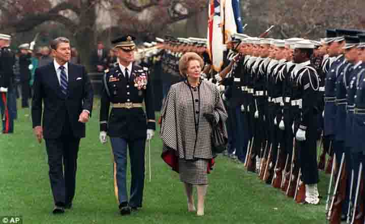 President Reagan and Prime Minister Thatcher reviewing troops. Image Credit: AP