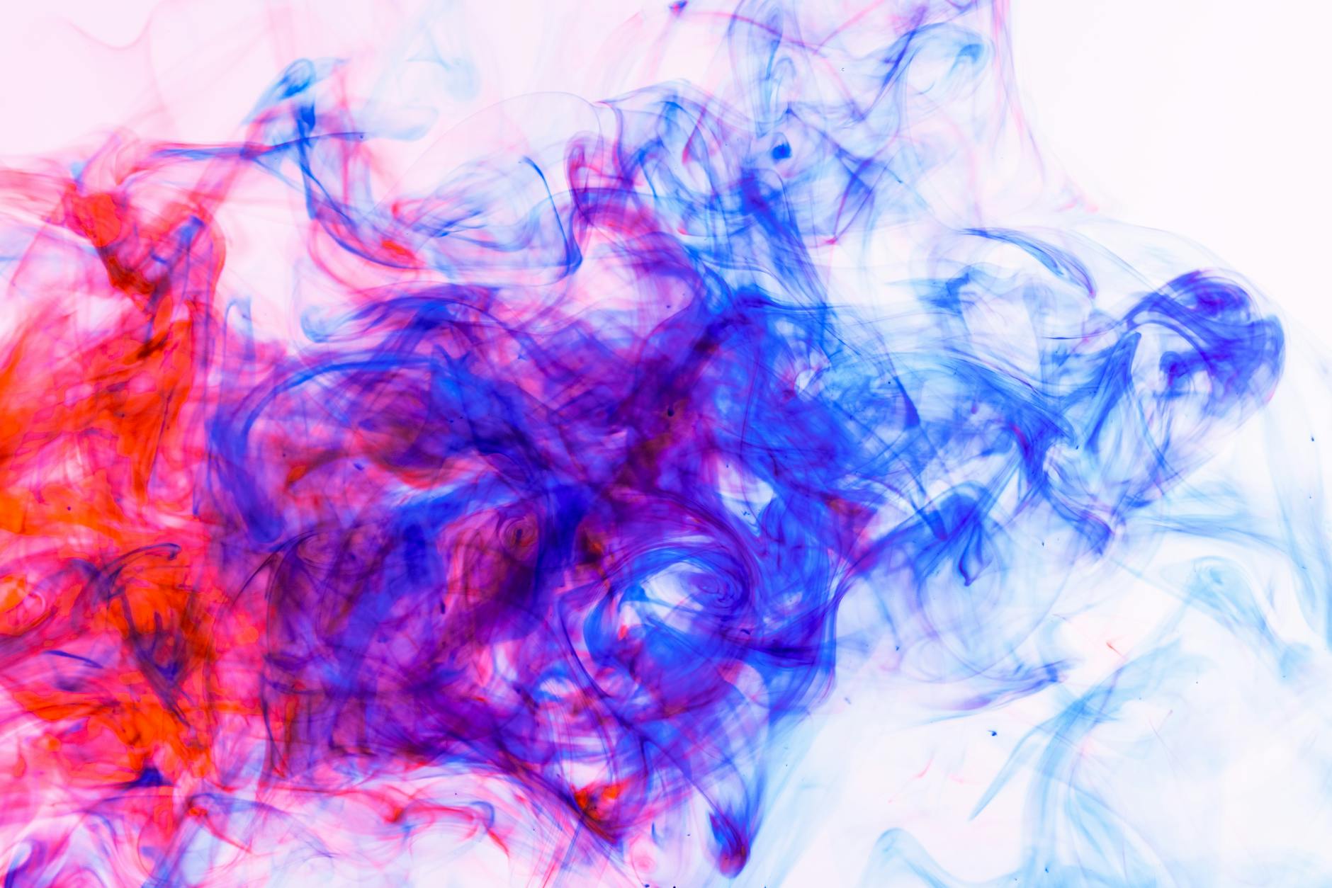 high speed photography of colorful ink diffusion in water