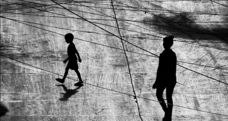 woman and son on town square