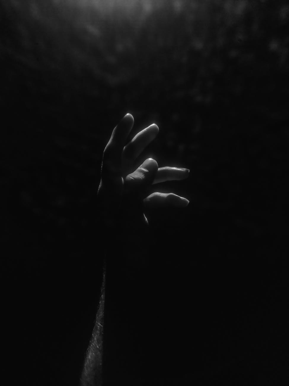 hand in darkness