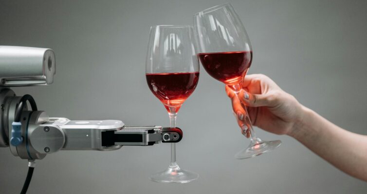 a robot holding a wine