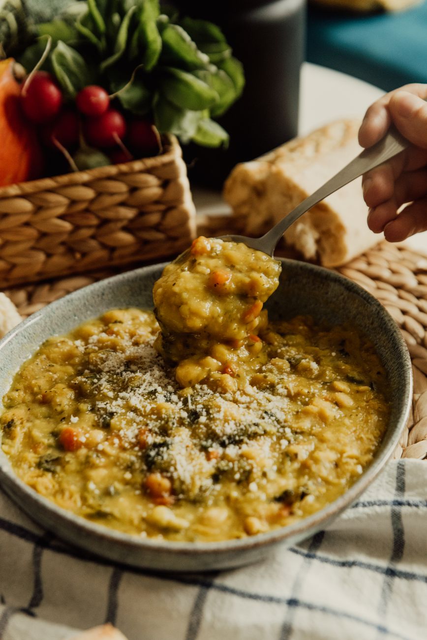 lentil soup in gray ceramic bowl