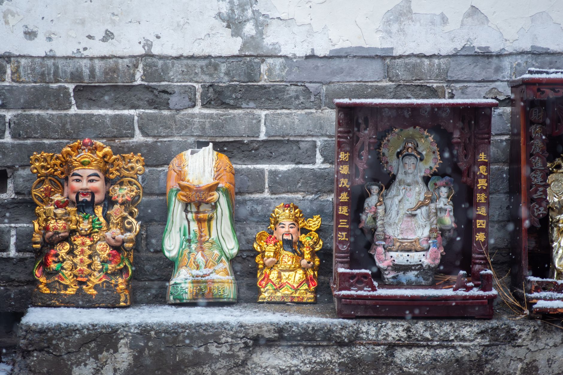 vibrant traditional statues in winter setting