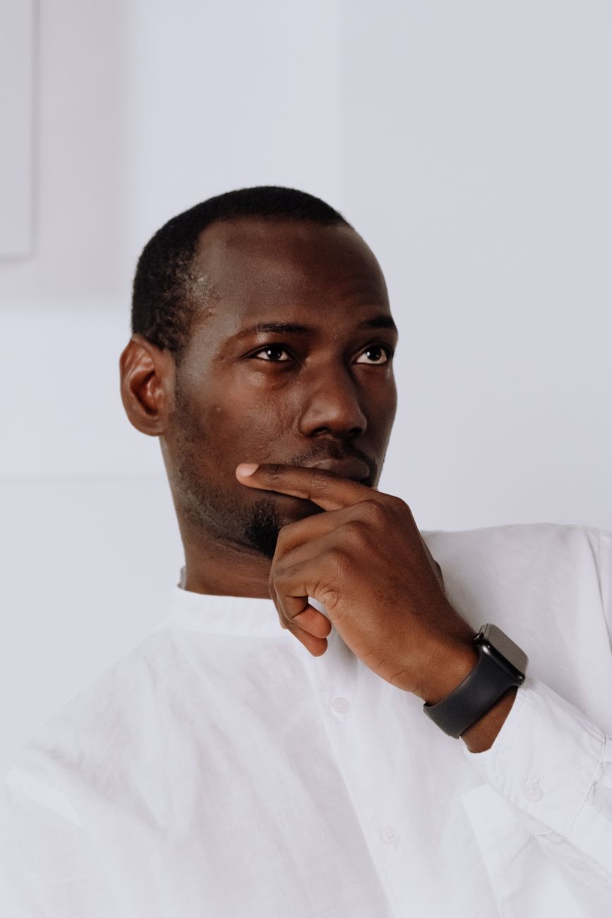 man in white dress shirt wearing black watch